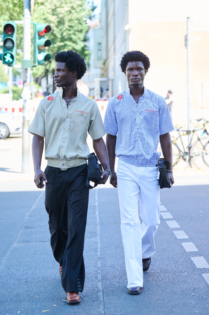 Herbert and Welbert Adjei Darko wearing DARKOS on a European city street